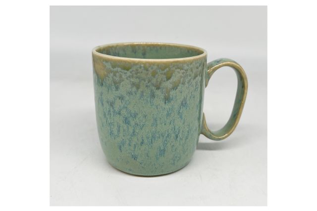 Pottery cup with turquoise glaze 