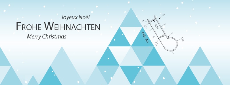 Schriftzug "Frohe Weihnachten" und Patentzeichnung eines Schlittens