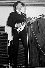 John Lennon with his Rickenbacker 325 (1964 in Belfast) 