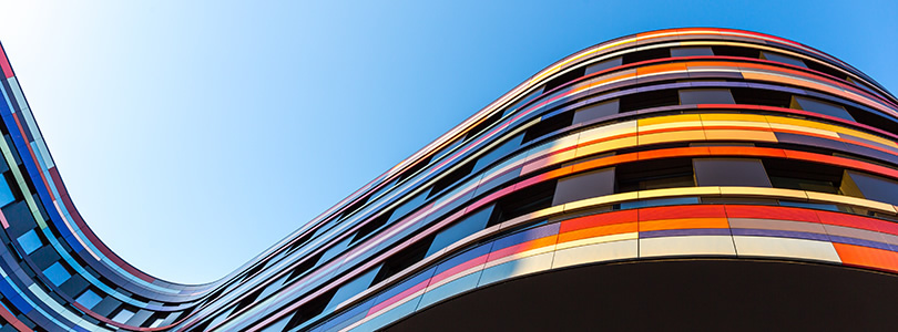 Colourful modern building facade in S-bend shape