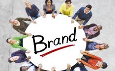 Round table with people and "Brand" inscription