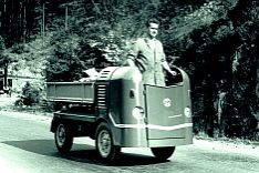 Transport cart with person standing inside